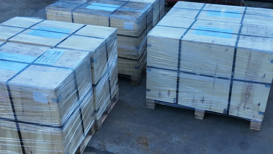 Log 15: 350 Aluminum Forged Support Brackets Packed for Germany(Image5) Banded wooden shipping crates containing packed aluminum forged support brackets