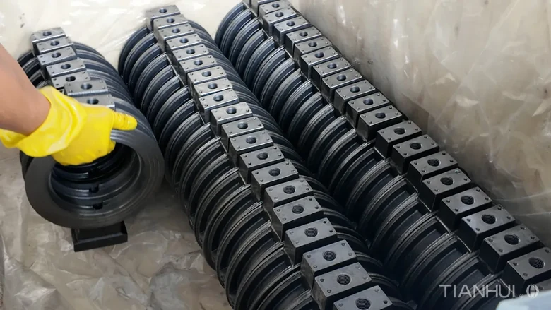Log 16: 1,000 6-Inch Stepped Butterfly Valve Bodies for Brazil(Image4) Butterfly valve bodies arranged in an open container with protective lining